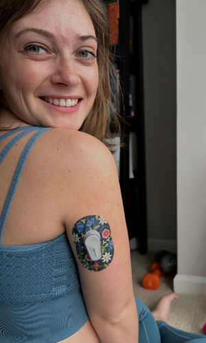 Woman with Floral Folklore Dexcom G6 Mini Tape on arm