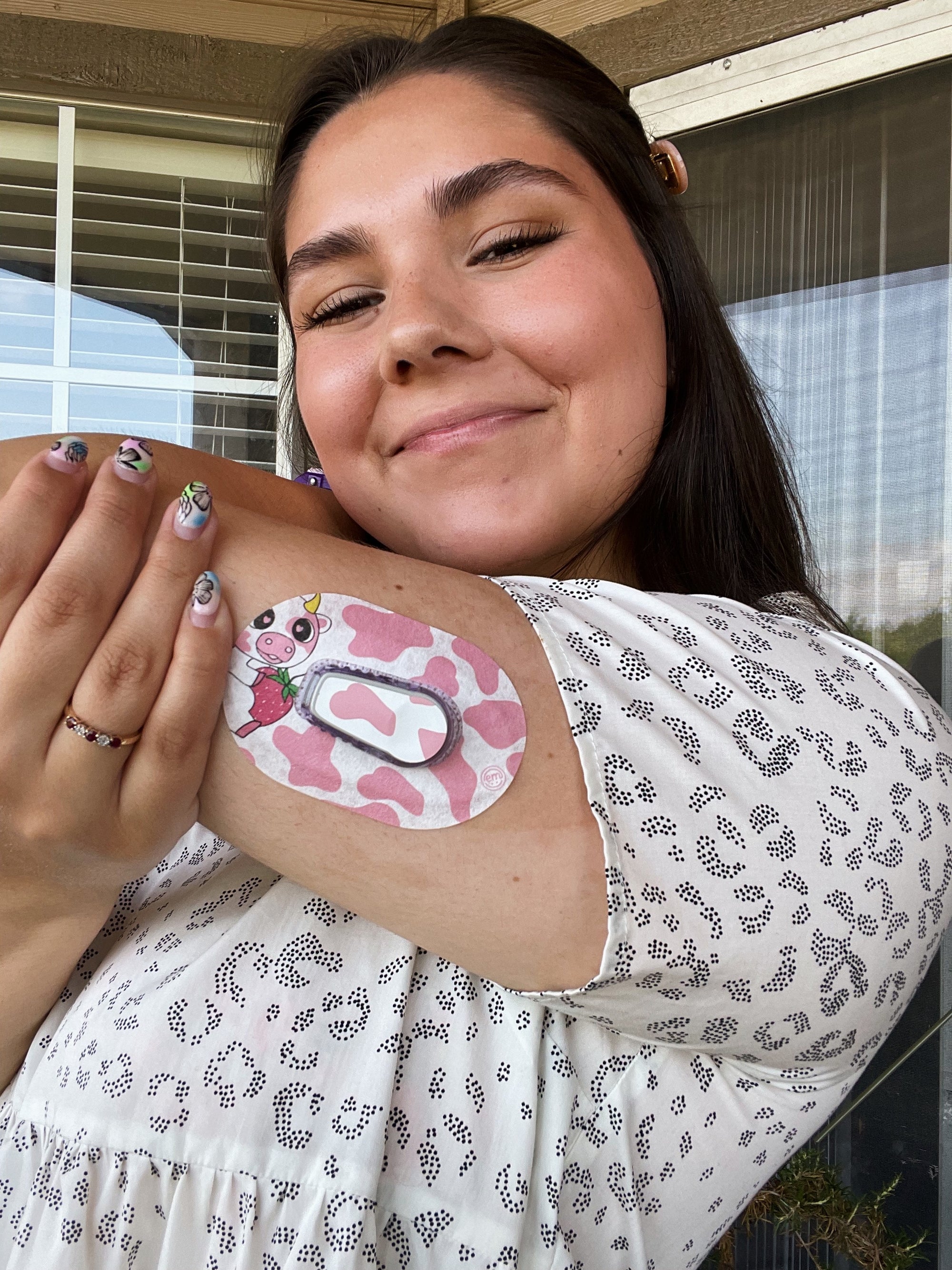 ExpressionMed Strawberry Cow Dexcom G6 Mini Tape, Single Tape and Single Sticker, Woman Wearing Cow Themed CGM Adhesive Patch Design